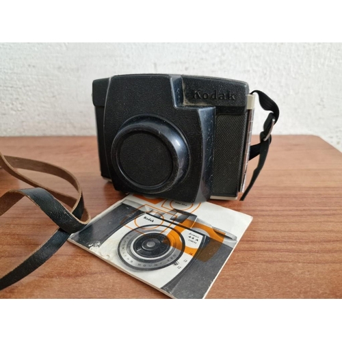 457 - 2 x Vintage Cameras with Instructions; Kodak Brownie 44A and Zenit-E 35mm Reflex Camera with Leather... 