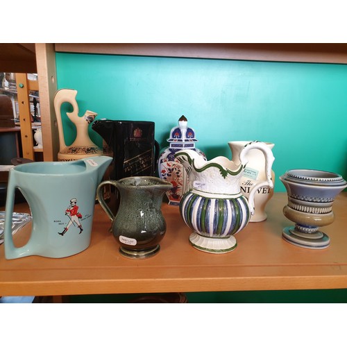 472 - A Varied Collection of Jugs and Urns including 