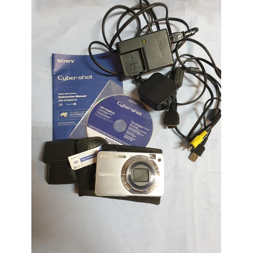 Sony CyberShot 10.1 Mega Pixels Digital Camera with Accessories (Un