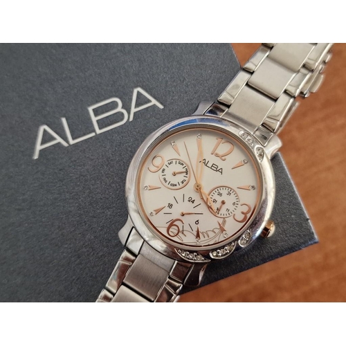 57 - Alba Stainless Steel Wrist Watch, (Model: V33J-X055) with Clear Stone Decorations in the Bezel, Whit... 