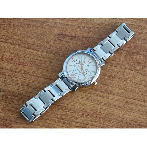 57 - Alba Stainless Steel Wrist Watch, (Model: V33J-X055) with Clear Stone Decorations in the Bezel, Whit... 