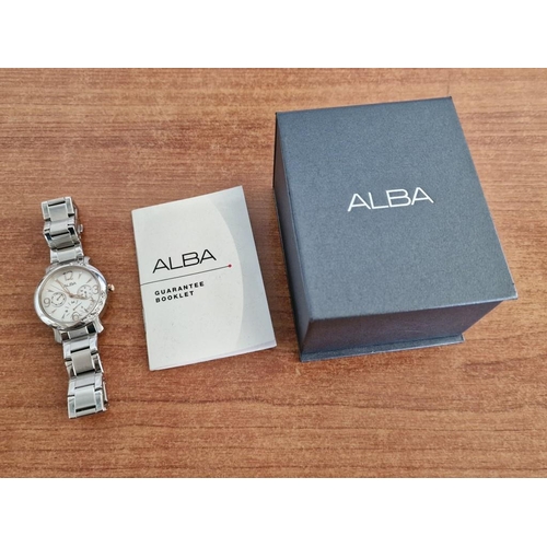 57 - Alba Stainless Steel Wrist Watch, (Model: V33J-X055) with Clear Stone Decorations in the Bezel, Whit... 