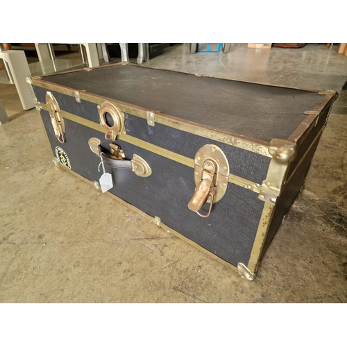 73 - Brass Bound Black Trunk, Marked 'Amnesty International, with 2 Clasps and 1 Handle, (Approx. 75 x 41... 