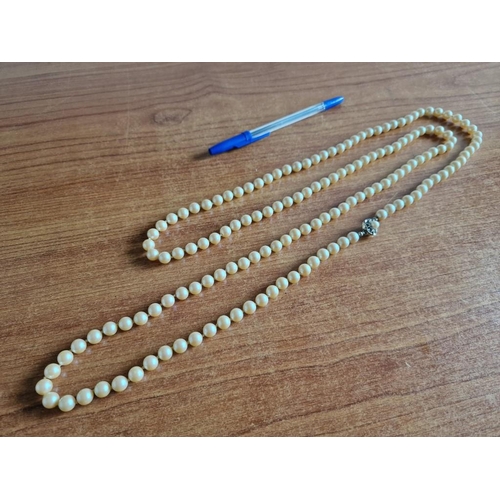 130 - Long Single Strand Pearl Necklace with Decorative Clasp, (Approx. L: 145cm, Ave. Ø: 8mm, Individuall... 