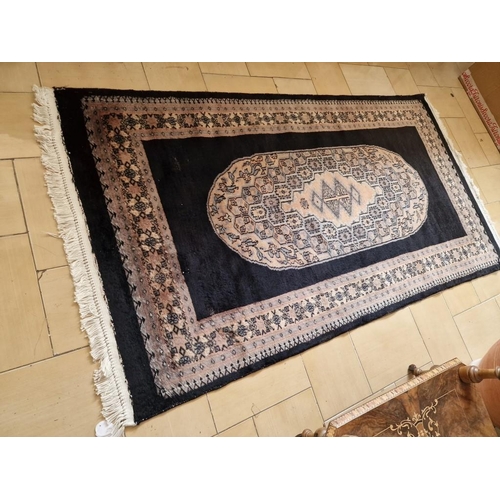 177 - Carpet with Black Background Colour and Patterned Oval Centre and Border, (Approx. 170 x 94cm)