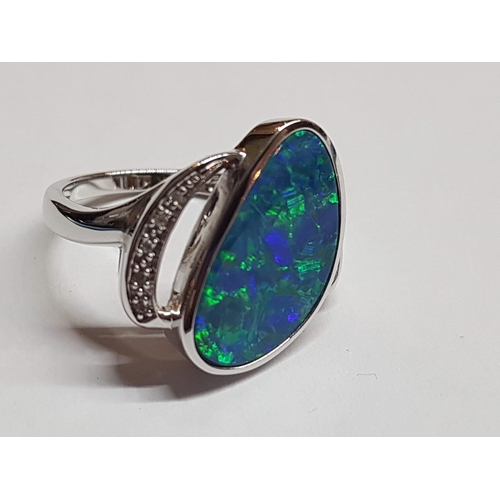 288 - 18ct Ring White Gold with Opal (?) and Diamonds, Size P Total Weight 6.67g