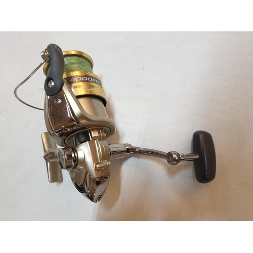 196 - 2 x Cased Fishing Reels; 1 x 