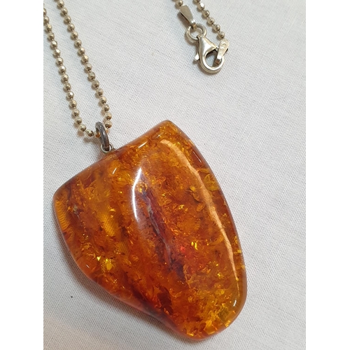 116 - Large Amber Stone Pendant on .925 Silver Chain and Pair of Amber .925 Silver Earrings, Total Weight ... 