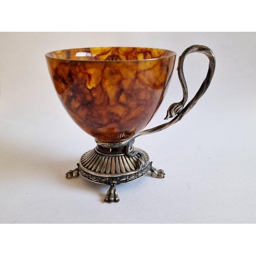 91 - Natural Russian Amber Cup with Decorative White Metal Base, Claw Feet, Lion Face and Shaped Handle, ... 