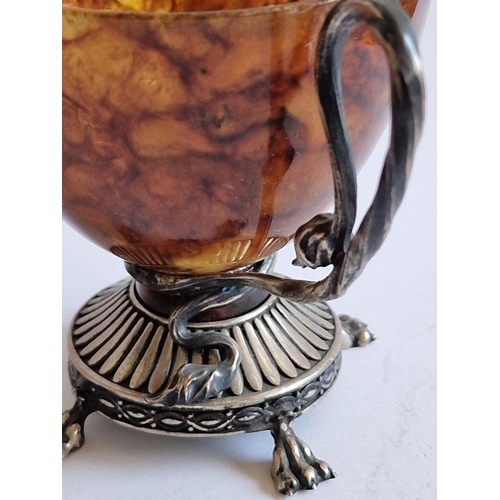 91 - Natural Russian Amber Cup with Decorative White Metal Base, Claw Feet, Lion Face and Shaped Handle, ... 