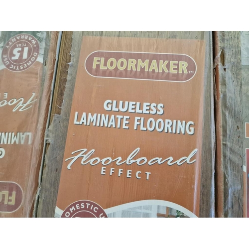 559A - 4 x Packs of 'Floormaker' Glueless Laminate Flooring, Tudor Oak Colour Wood Floorboard Effect, (Each... 