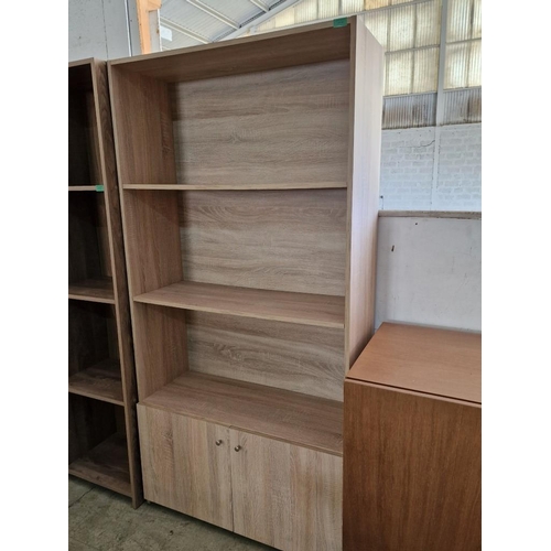 678 - Light Wood Colour 3-Tier Book Case Over Double Cupboard, (Approx. 90 x 35 x 181cm)