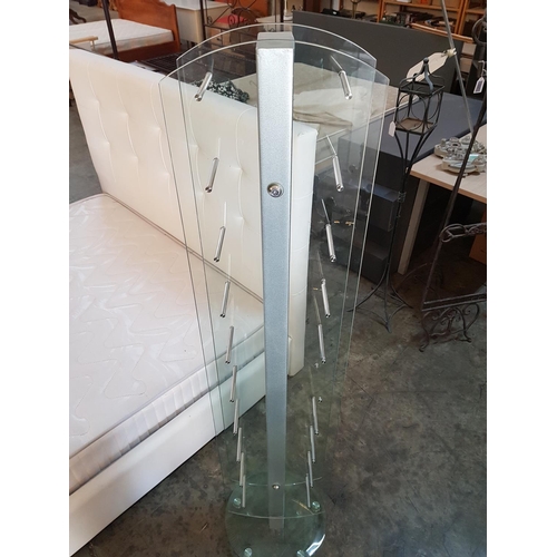 293 - Modern Glass / Chrome CD Rack on Round Base (A/F), (12 x 31 x 157cm) on