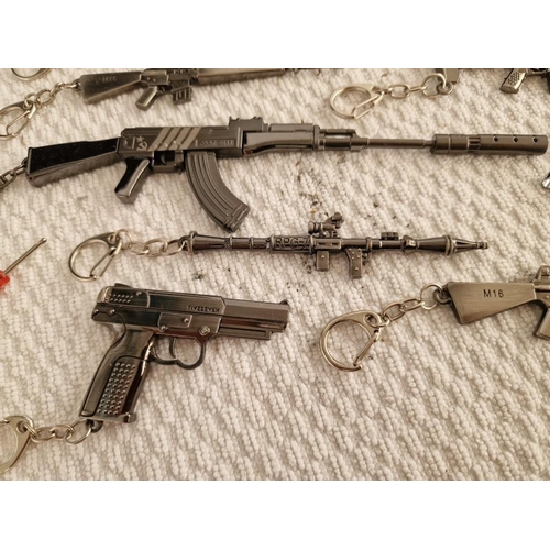 119 - Large Collection of Assorted Key Rings with Ornamental Guns, Rocket Launcher, Knives, etc (18)