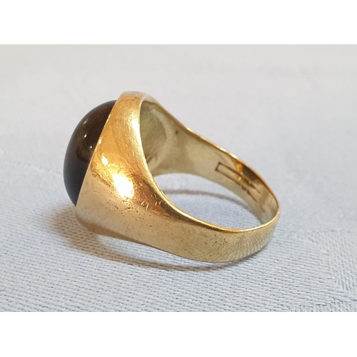 166 - 9ct Gold Men's Ring with Black Stone, Total Weight 9.3gr

* Tested with XRF Metal Analyser *