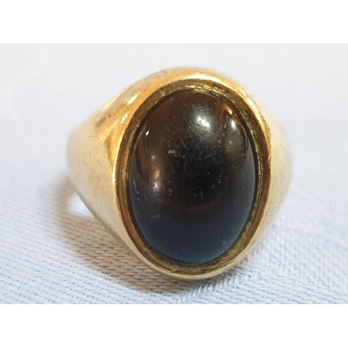 166 - 9ct Gold Men's Ring with Black Stone, Total Weight 9.3gr

* Tested with XRF Metal Analyser *