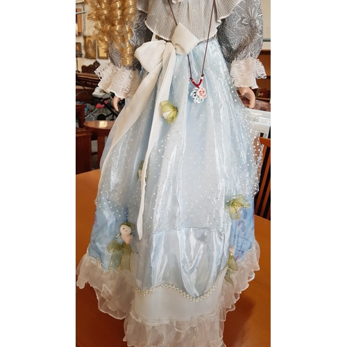 210 - Victorian Style Large Porcelain Doll (H:100cm) with Golden Curls and Light Blue Dress