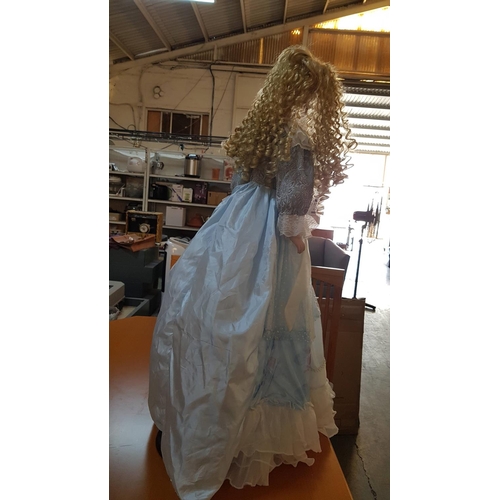 210 - Victorian Style Large Porcelain Doll (H:100cm) with Golden Curls and Light Blue Dress