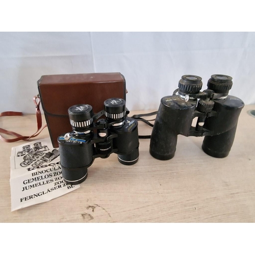 71 - 2 x Pairs of Tasco Binoculars; 'Zip 106Z' 8x - 16x40 and 8x - 15x50, one with case and manual, (2)