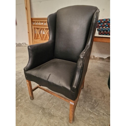 812 - Black Leatherette Wing Back Armchair Over Wooden Legs, (a/f)