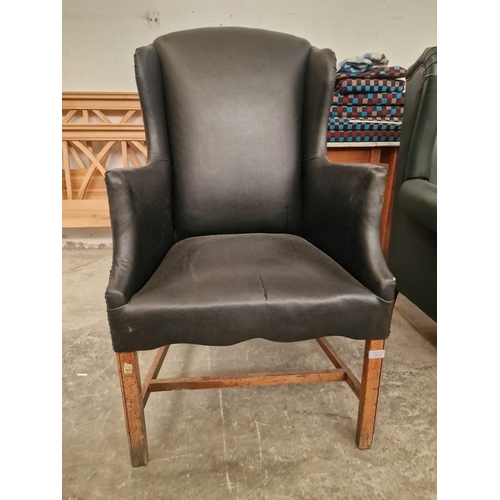 812 - Black Leatherette Wing Back Armchair Over Wooden Legs, (a/f)