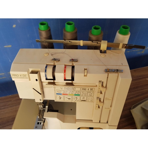 145 - Elna Lock Pro4 De Electronic Overlock Sewing Machine (Un-Tested) with Quantity of Colourful Sewing T... 