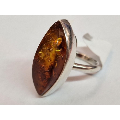 202 - Sterling Silver Ring Set with Large 'Eye' Shape Amber, (Approx. Size: Q, Weight: 9.2g)