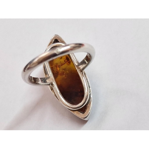 202 - Sterling Silver Ring Set with Large 'Eye' Shape Amber, (Approx. Size: Q, Weight: 9.2g)