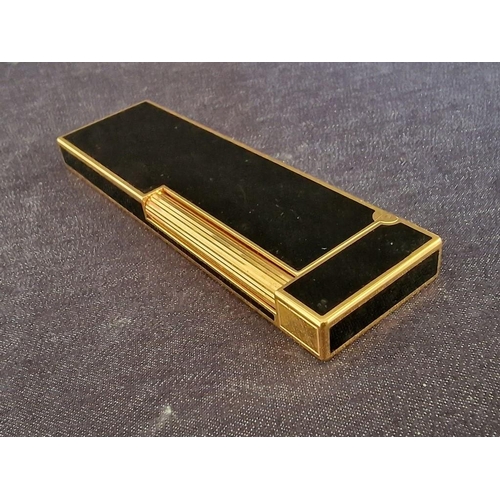 106 - S.T. Dupont (Paris) Black Chinese Lacquer & Gold Table Lighter, (Approx. 12.5 x 3.5 x 1.2cm)