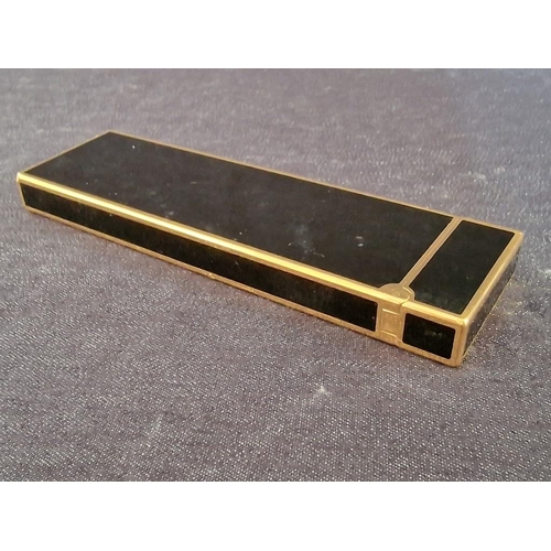 106 - S.T. Dupont (Paris) Black Chinese Lacquer & Gold Table Lighter, (Approx. 12.5 x 3.5 x 1.2cm)