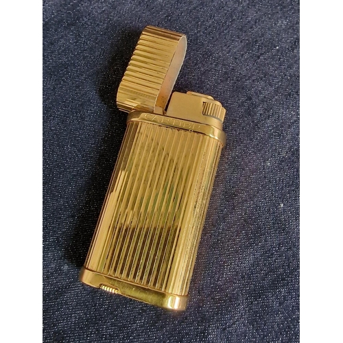 109 - Cartier Trinity Lighter, Gold Plated, Oval Shape, Swiss Made