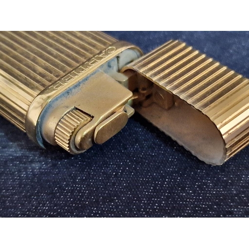 109 - Cartier Trinity Lighter, Gold Plated, Oval Shape, Swiss Made