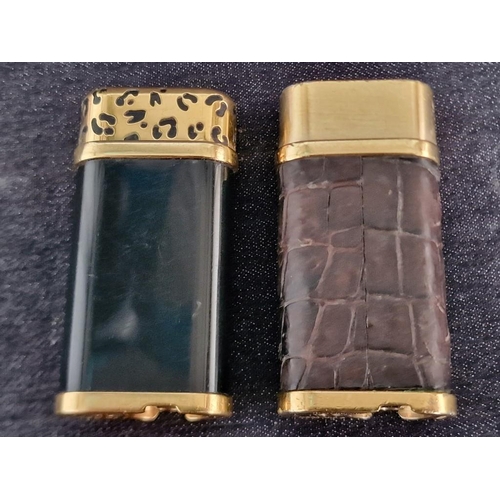 110 - 2 x Cartier Trinity Lighters; Gold Plated with Black Lacquer and Leather Clad, (A/F, Nb. Both Missin... 