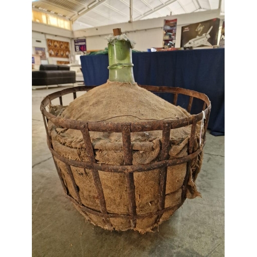 82 - Large Handblown Antique Green Glass Carboid / Demi John / Wine Jug in Metal Basket with Straw & Hess... 