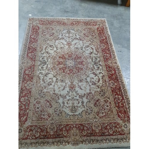 247 - 100% Polyester Carpet with Beige Background and Brown / Red Patterning (240 x 170cm)