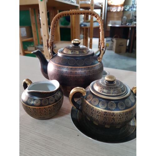 19 - Black and Gold Hiroma Japanese Porcelain Tea Set; Tea Pot with Lid and Sugar Strainer, Bowl with Lid... 