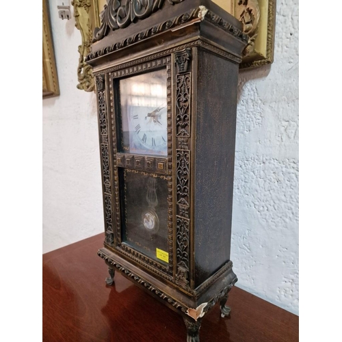 107 - Decorative Mantle Clock with Carved Front Over Claw Feet, Quartz Movement with Pendulum (untested)