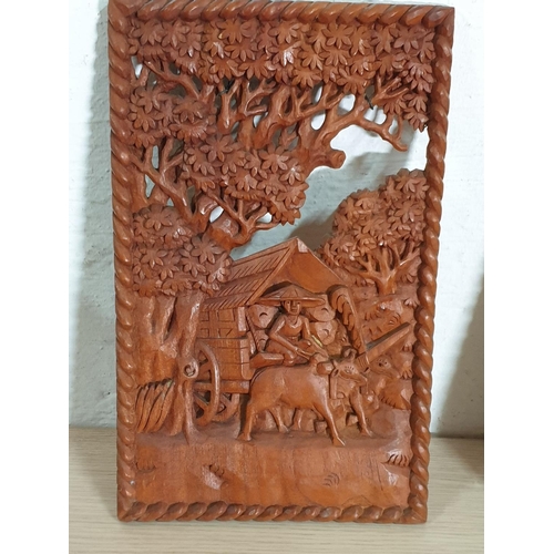 193 - Oriental Rural Scenes; 2 x Carving Wooden Wall Panels (24.5 x 28.5 and 24 x 29cm)