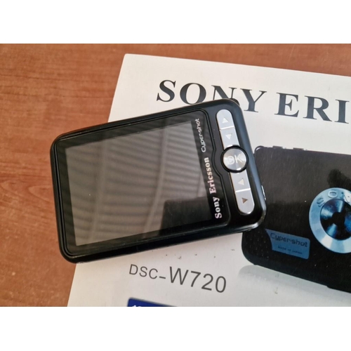 392 - Sony Ericsson DSC-W720 Portable Camera (Un-Tested) Together with Soy RMT - 814 Camcorder Remote Cont... 