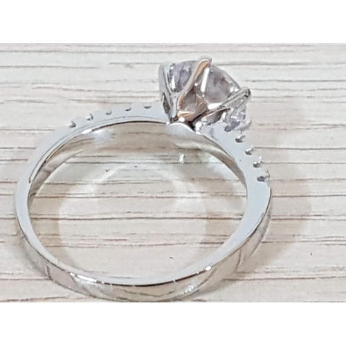 158 - Silver Solitaire Engagement Ring with Side Small Stones and Large Clear Crystal Stone in Center in D... 