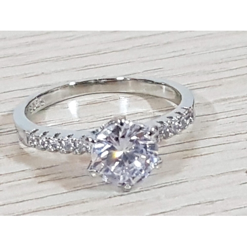 217 - Silver Solitaire Ring with Side Small Clear Stones and Large Clear Crystal Stone in Center in Diamon... 