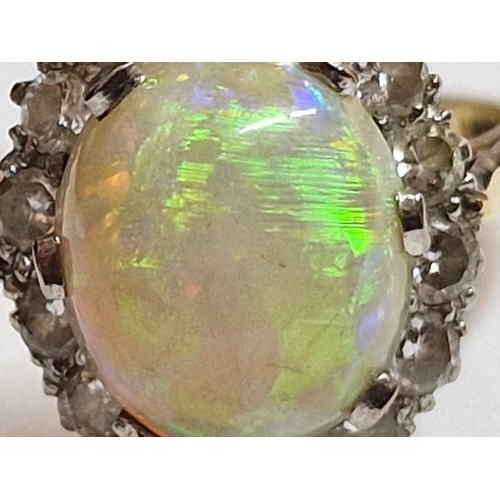 110 - 18ct Gold, Opal (?) and Diamond Ring; Oval Shape Centre Stone, Approx. 11 x 9mm Overall with 14 x Su... 