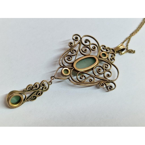 86 - Elegant 9ct Gold Pendant Set with Green Stones, (Approx. 8.1g, H: 7cm), on Yellow Metal Chain, (Appr... 