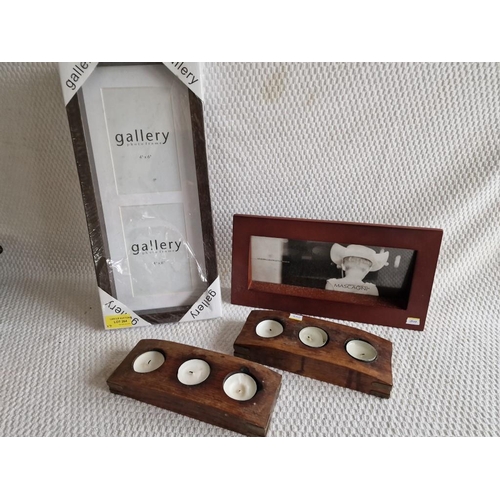 525 - 2 x Solid Wood 3-Candle Holders, Together with 2 x Photo Frames, (4)