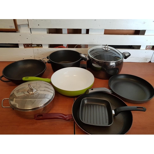 131 - Collection of Large Tefal, Cast Iron, Stainless Steel Cooking Pots, Pans, Wok etc (8pcs)