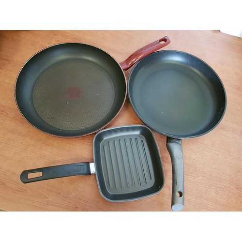 131 - Collection of Large Tefal, Cast Iron, Stainless Steel Cooking Pots, Pans, Wok etc (8pcs)