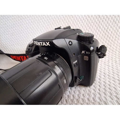 712 - Pentax K10D SLR Camera; 10 MP, Shake Reduction, Weather Resistant, 16GB Memory Card, Together with T... 