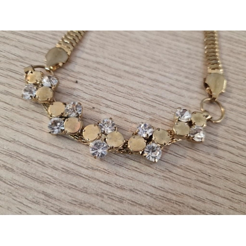 284 - Collection of 4 x Necklaces; 2 x Gold Tone with Clear Stones, and 2 x Floral Design, (4)