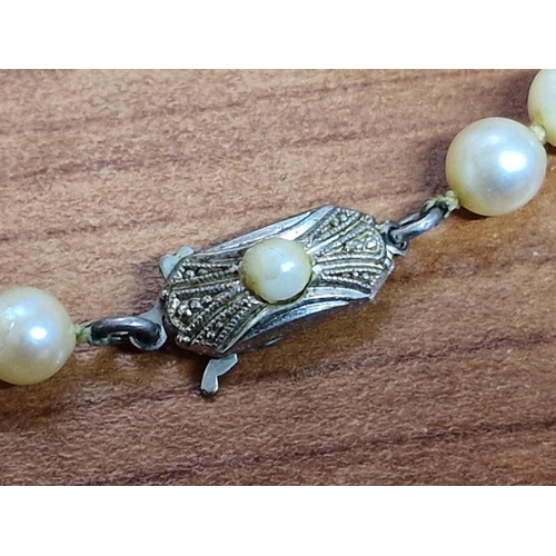 457 - Pearl Necklace, Single Strand Individually Knotted with Decorative White Metal Clasp, Together with ... 