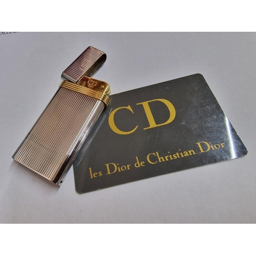 134 - Christian Dior (Paris) Stainless Steel Gas Lighter with Gold Tone Band, Swiss Made